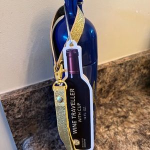 Wine traveler with cup